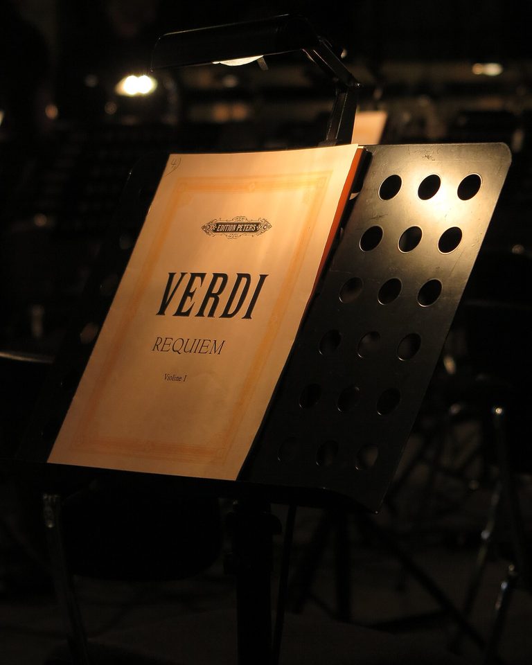 A music stand holding an open score