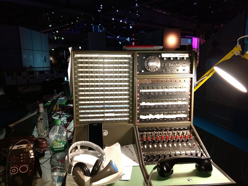 A manual telephone switchboard, where every call was answered by hand