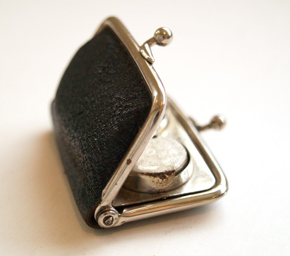 A clasp purse: money kept to hand and closed with one movement